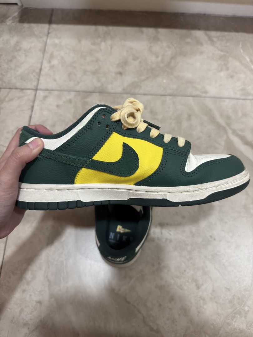 Nike Dunk Low Retro SE Oregon Ducks FD0350-133 (Category: Sneakers) located in Cabuyao City. Submitted by nanana.n (Listing ID 1467171965, Image 2). Description: Size: US 6.5 / EU 37.5/ UK 4/ CN 235 Super good condition, very lightly used - Brand: Nike Dunk Low Retro SE - Colorway: Oregon Ducks (Deep Green / Yellow / White) - Details: Perforated toe box, vintage cream laces, and classic leather low-top design RFS Decluttering Laguna or Pasay area