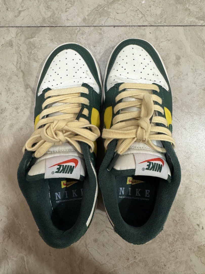 Nike Dunk Low Retro SE Oregon Ducks FD0350-133 (Category: Sneakers) located in Cabuyao City. Submitted by nanana.n (Listing ID 1467171965, Image 1). Description: Size: US 6.5 / EU 37.5/ UK 4/ CN 235 Super good condition, very lightly used - Brand: Nike Dunk Low Retro SE - Colorway: Oregon Ducks (Deep Green / Yellow / White) - Details: Perforated toe box, vintage cream laces, and classic leather low-top design RFS Decluttering Laguna or Pasay area