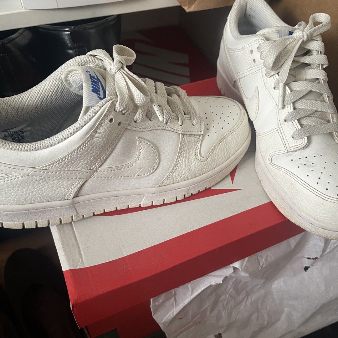 Nike Dunk Low SE GS US 8 Sail White Game Royal (Category: Sneakers) located in Muntinlupa City. Submitted by sza1123 (Listing ID 1467171321, Image 2). Description: - Model: Nike Dunk Low - Colorway: Sail, White, and Game Royal - Size: 7Y (Grade School) US 8 - Details: Textured leather overlays, blue tongue branding, royal blue insoles, and white laces - Inclusion: Complete with original red Nike shoebox - Shipping: Can ship nationwide via J&T (bu