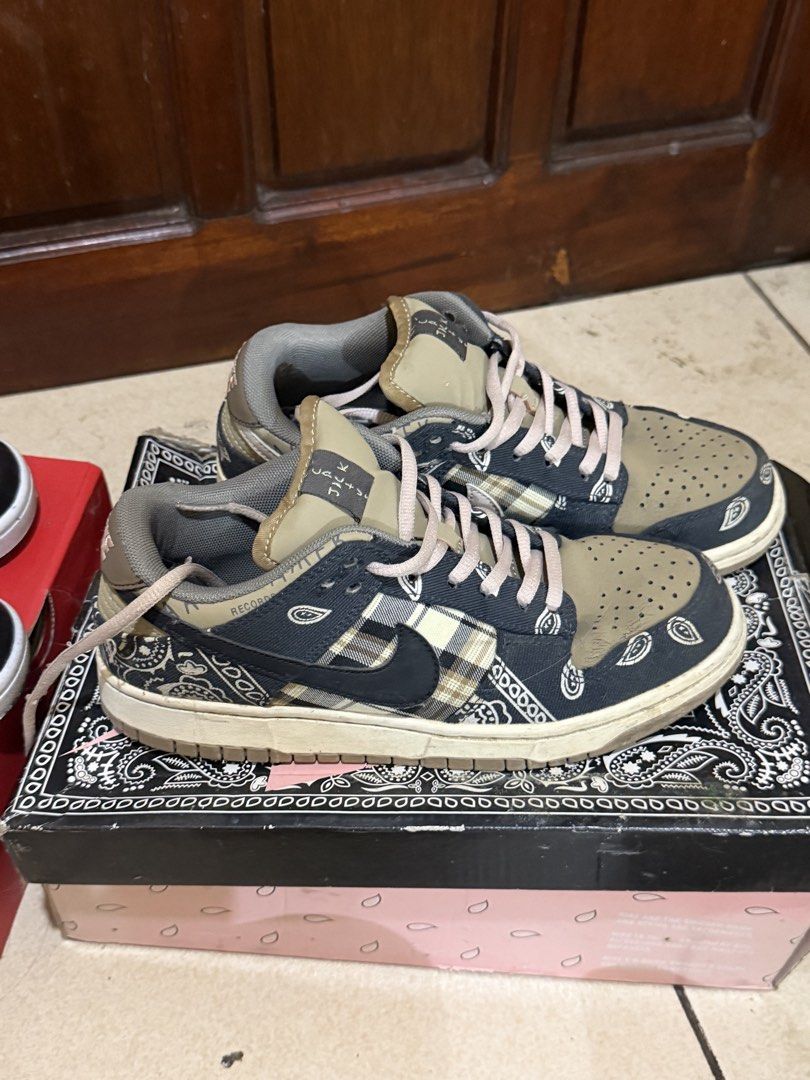 Nike Dunk Low Travis Scott Cactus Jack Sneakers With Box (Category: Sneakers) located in Las Pinas. Submitted by sae_reiah (Listing ID 1467302082, Image 1). Description: - Model: Travis Scott x Nike Dunk Low - Design: Paisley canvas overlays, plaid side panels, and brownish taupe suede toe box - Details: Black swoosh and thick cream laces - Condition: Worn a few times, minor dirt on soles, loads of life left - Packaging: Includes special edition 