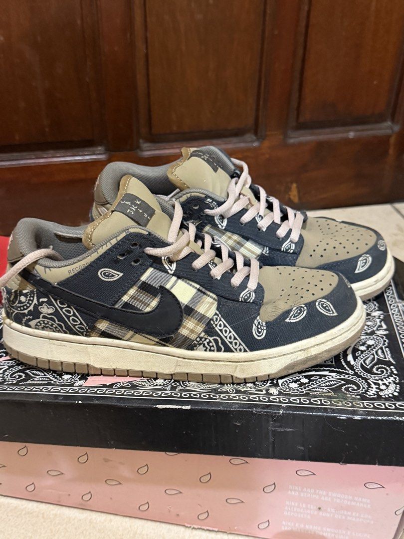 Nike Dunk Low Travis Scott Cactus Jack Sneakers With Box (Category: Sneakers) located in Las Pinas. Submitted by sae_reiah (Listing ID 1467302082, Image 2). Description: - Model: Travis Scott x Nike Dunk Low - Design: Paisley canvas overlays, plaid side panels, and brownish taupe suede toe box - Details: Black swoosh and thick cream laces - Condition: Worn a few times, minor dirt on soles, loads of life left - Packaging: Includes special edition 