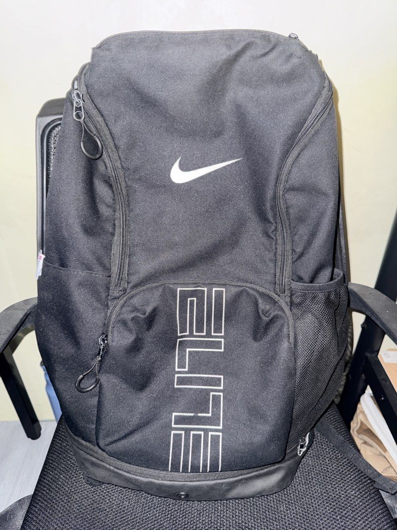 Nike Elite Backpack Black V3 (Category: Backpacks) located in Cavite. Submitted by aneps3 (Listing ID 1467191081, Image 1). Description: -bigyan nyo nalang ako offer - Authentic black Nike basketball backpack with iconic white swoosh and ELITE vertical lettering - Dual-zipper main compartments offering massive storage for shoes, clothes, and gear - Comfortable gel-padded shoulder straps and a secure buckled sternum strap - Durable bottom panel bu