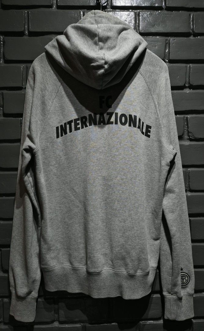 NIKE INTERNAZIONALE HALF ZIP HOODIE (Category: Coats, Jackets and Outerwear) located in Davao. Submitted by rodrigoani57168 (Listing ID 1467230962, Image 2). Description: - Brand: Nike - Team: Inter Milan Futbol De Italia - Color: Grey - Style: Half-zip hoodie with kangaroo pocket - Details: Graphic print with star on chest, branded metal aglets on drawstrings - Sleeve Details: Nike logo tag on one sleeve, embroidered club crest on the other - No