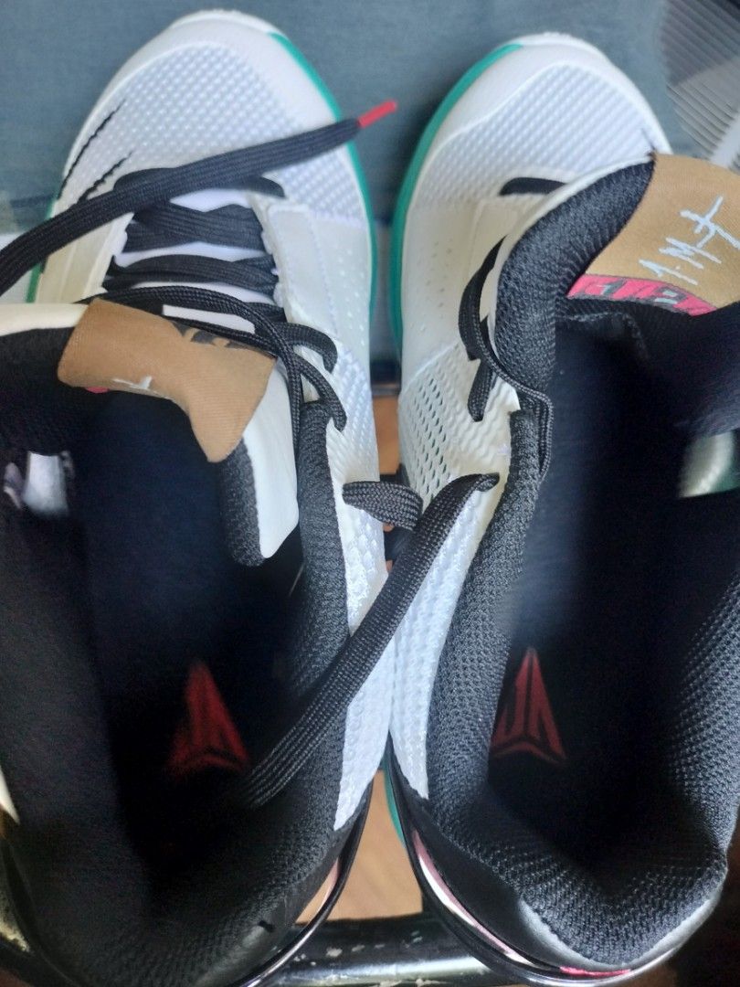 Nike Ja 1 Scratch Basketball Shoes (Category: Sneakers) located in Pasay City. Submitted by bigitogarc30663 (Listing ID 1467175609, Image 1). Description: - Model: Nike Ja 1 Basketball Shoes - Colorway: White, Teal, and Pink with black scratch graphics - Size: US 8 - Features: Air Zoom cushioning and signature Ja Morant branding - Outsole: White textured sole with 'START FROM SCRATCH' text - Condition: Clean uppers and pristine outsoles, fresh an