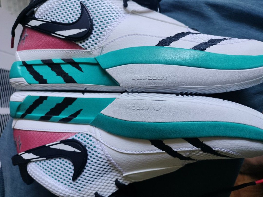 Nike Ja 1 Scratch Basketball Shoes (Category: Sneakers) located in Pasay City. Submitted by bigitogarc30663 (Listing ID 1467175609, Image 3). Description: - Model: Nike Ja 1 Basketball Shoes - Colorway: White, Teal, and Pink with black scratch graphics - Size: US 8 - Features: Air Zoom cushioning and signature Ja Morant branding - Outsole: White textured sole with 'START FROM SCRATCH' text - Condition: Clean uppers and pristine outsoles, fresh an