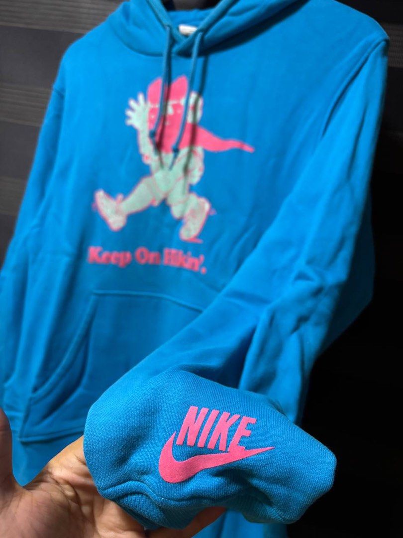Nike Keep On Hikin Blue Hoodie (Category: Coats, Jackets and Outerwear) located in Pasig City. Submitted by abogadosupremo (Listing ID 1467346052, Image 3). Description: - Cool blue Nike hoodie - Features 'Keep On Hiking' graphic print - Small Nike logo on the sleeve - Ideal for casual wear - Please check photos for detailed condition - 100% Legit and Authentic - Very Good Condition - Color may vary due to lighting - No issue at all - Size : Can 
