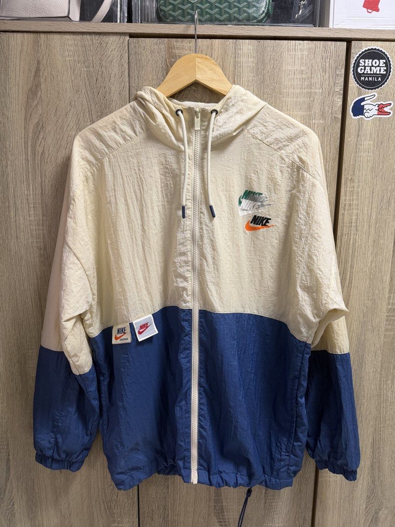 Nike Multiswoosh Windbreaker Jacket (Category: Coats, Jackets and Outerwear) located in Imus. Submitted by rckrmns (Listing ID 1467345749, Image 2). Description: Nike Multiswoosh Windbreaker Jacket Size Large W- 23.5 L- 28 Good as new 1800.