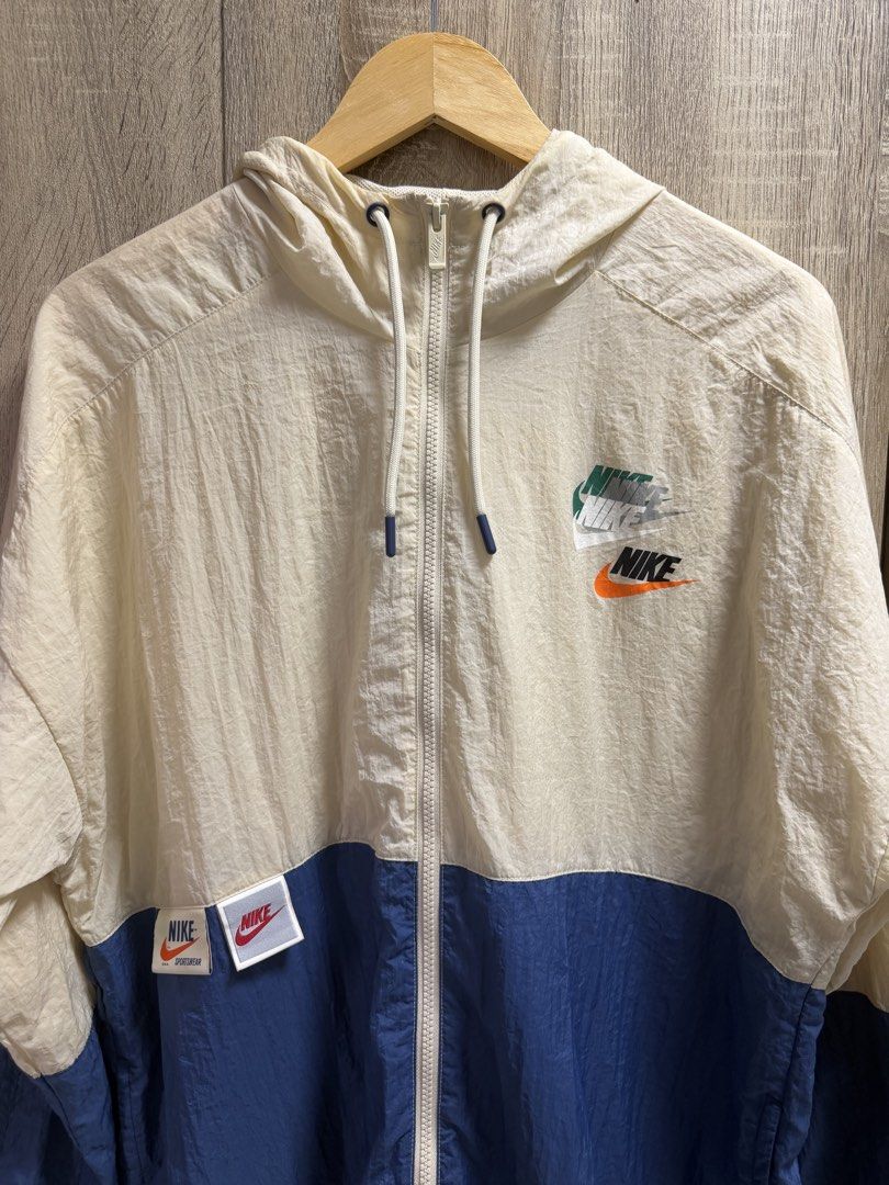 Nike Multiswoosh Windbreaker Jacket (Category: Coats, Jackets and Outerwear) located in Imus. Submitted by rckrmns (Listing ID 1467345749, Image 3). Description: Nike Multiswoosh Windbreaker Jacket Size Large W- 23.5 L- 28 Good as new 1800.