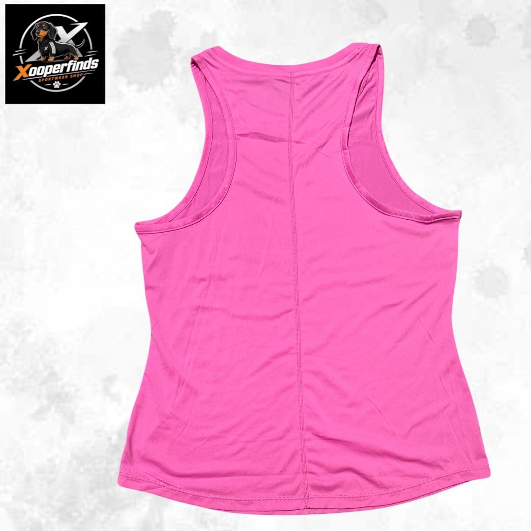 Nike one drifit tabk top large (Category: Activewear) located in Iba. Submitted by xooperfindslb (Listing ID 1467324395, Image 3). Description: Nike one drifit tank top Pink Large on tag Chest width when laid flat - 15.5 inches No issue Like new.