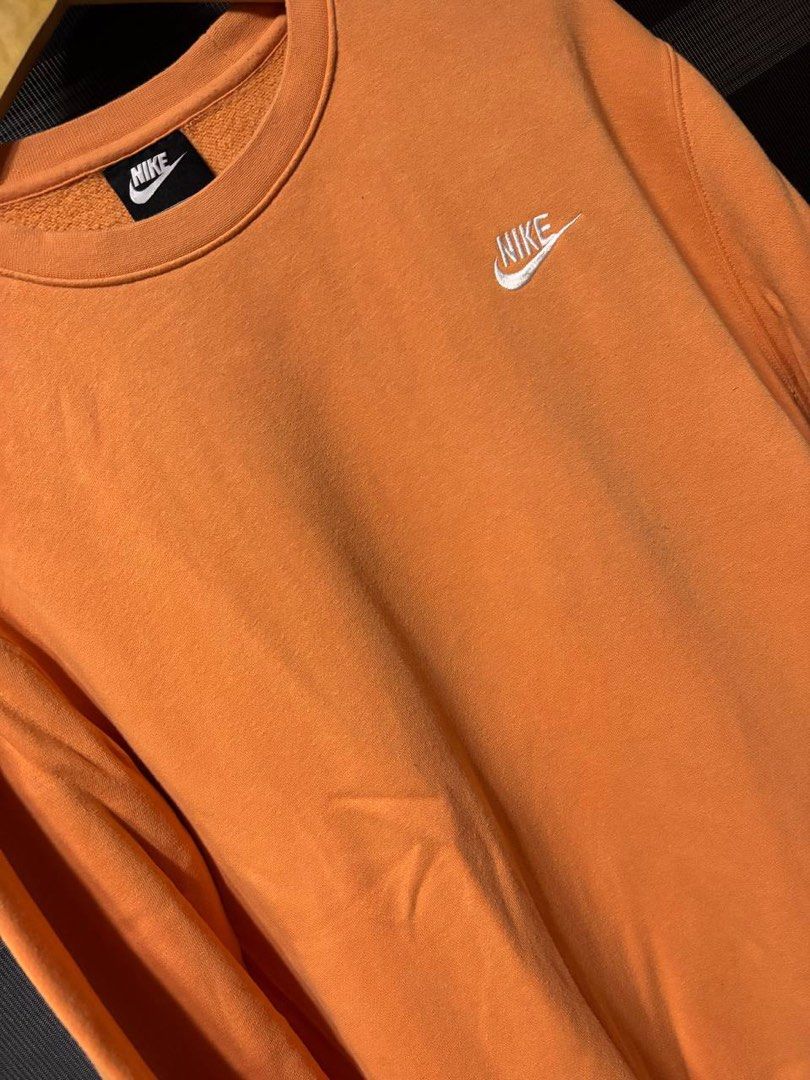Nike Orange Crewneck Sweatshirt (Category: Coats, Jackets and Outerwear) located in Pasig City. Submitted by abogadosupremo (Listing ID 1467352876, Image 3). Description: - Classic orange Nike crewneck sweatshirt - Features a small embroidered Nike logo on the chest - Ideal for casual wear - Offers both comfort and style - 100% Legit and Authentic - Very Good Condition - Color may vary due to lighting - No issue at all - Size : Can fit to L to XL