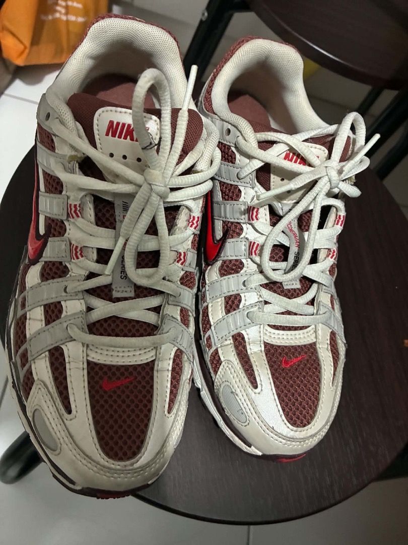 Nike P-6000 Sail Metallic Red Bronze (Category: Sneakers) located in Manila. Submitted by kissa.1890 (Listing ID 1467328327, Image 2). Description: - Brand: Nike P-6000 - Colorway: Sail, Metallic Red, and Bronze - Size: US 8.5 / UK 6 / EUR 40 - Design: Mesh upper, leather overlays, bold red swoosh, and chunky rubber outsole Condition : 8/10 No issues Rfs : Declutter.