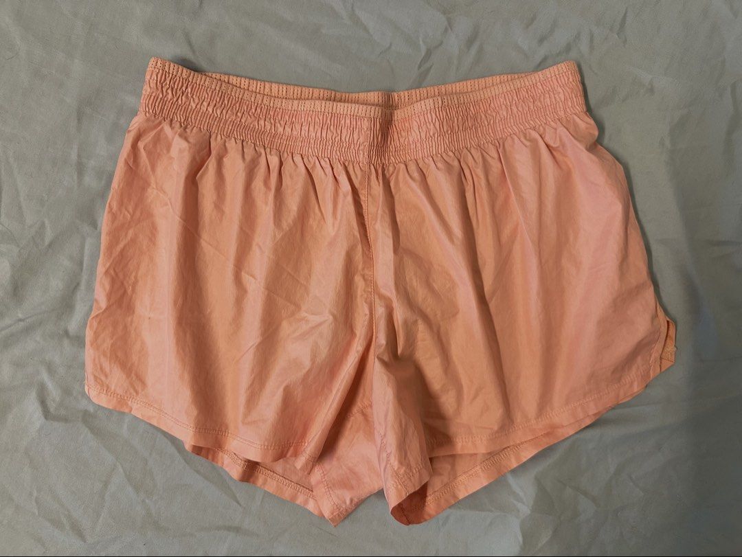 Nike Peach Running Shorts (Category: Shorts) located in Mandaluyong City. Submitted by kjannah (Listing ID 1467203018, Image 1). Description: Brand: Nike Color: Peach pink Size: Medium *Color may vary due to lighting. *No return, no refund policy.