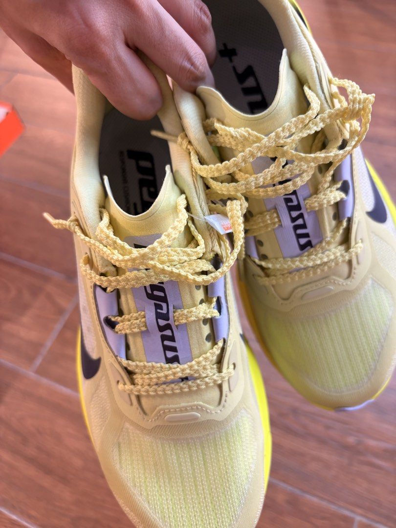 Nike Pegasus Premium plus 2 (Category: Sneakers) located in Quezon City. Submitted by edfghjklnncpl (Listing ID 1467293544, Image 2). Description: - Brand: Nike Pegasus - Color: Bright yellow with dark navy swoosh - Size: US 6.5 / UK 4 / EUR 37.5 - Condition: Brand new with Sports Central retail tag still attached - Features: Textured yellow laces, white tongue branding, blue Pegasus-printed insoles - Soles & Uppers: 100% clean and crisp.