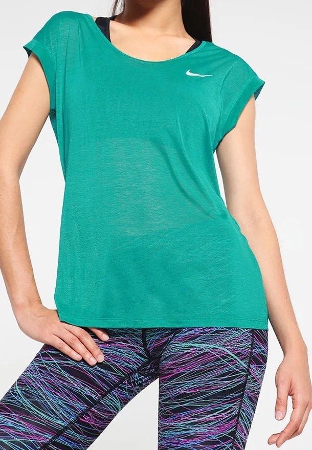 Nike performance sports top medium (Category: Activewear) located in Iba. Submitted by xooperfindslb (Listing ID 1467318083, Image 1). Description: Nike performance sports top Lightweight Green Medium on tag Chest width when laid flat-19 inches Like new No issue .