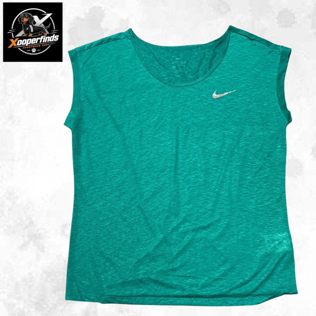 Nike performance sports top medium (Category: Activewear) located in Iba. Submitted by xooperfindslb (Listing ID 1467318083, Image 2). Description: Nike performance sports top Lightweight Green Medium on tag Chest width when laid flat-19 inches Like new No issue .
