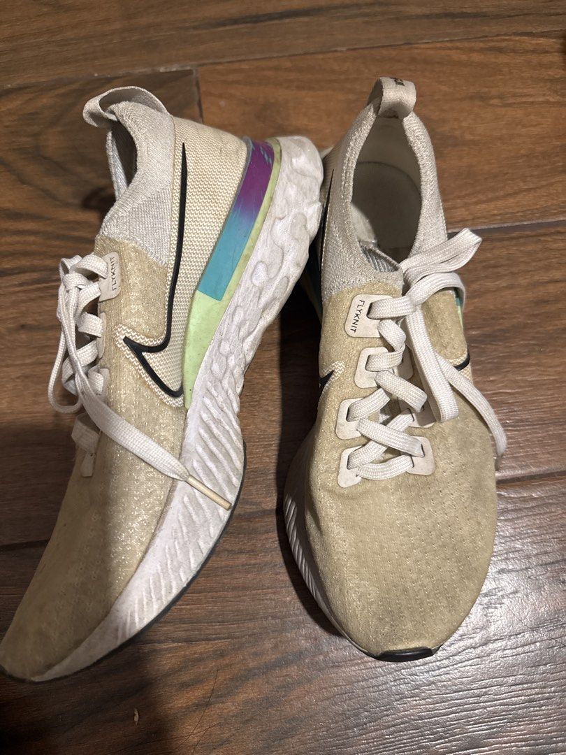 Nike React Infinity Run Flyknit (Category: Sneakers) located in Manila. Submitted by jeanyny (Listing ID 1467317021, Image 2). Description: - Brand: Nike - Model: React Infinity Run Flyknit - Style Code: CD4372-102 - Colorway: Cream knit upper with purple, blue, and lime green heel clip - Sole: White React foam midsole with durable black outsole - Size: US 8.5 | UK 6 | EUR 40 | CM 25.5 - Condition: Excellent / Pre-loved (Made in Vietnam) - Featur