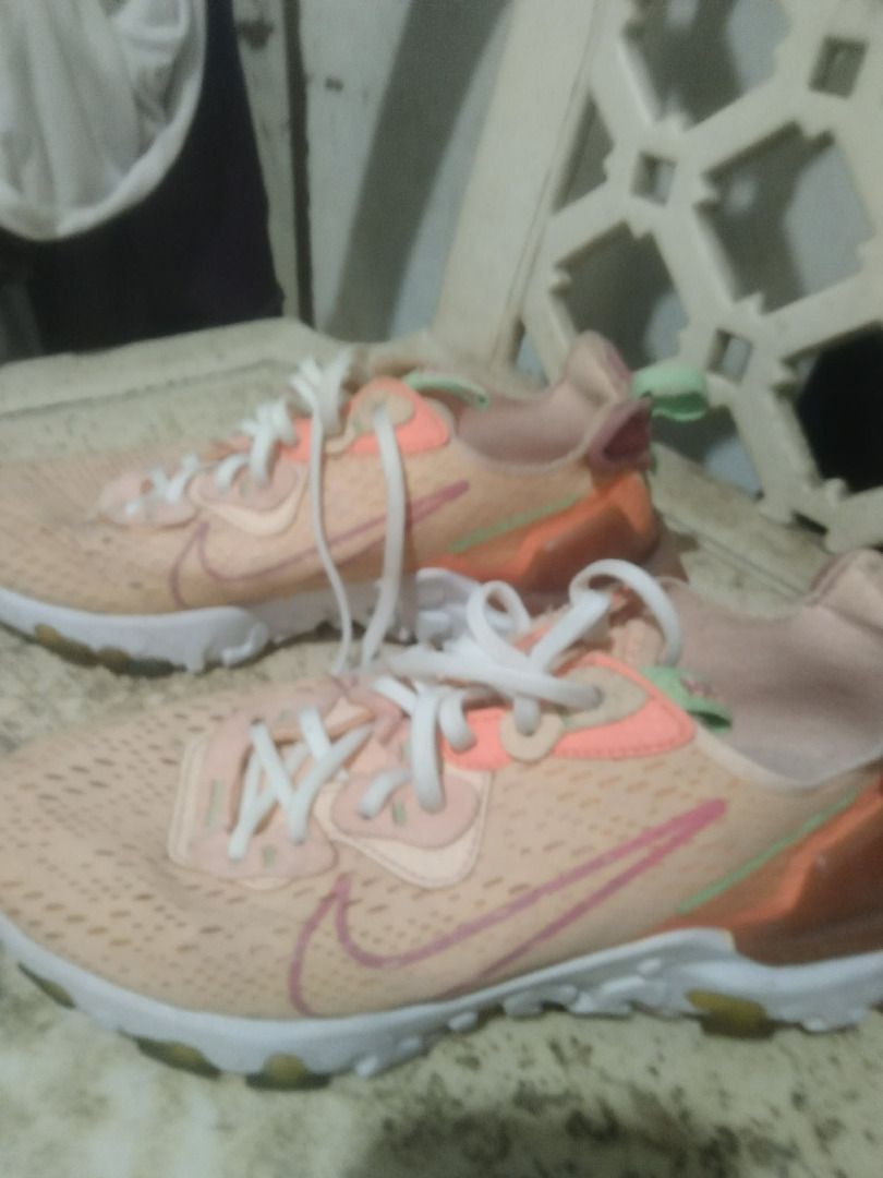 Nike React Vision Peach Pink Sneakers (Category: Sneakers) located in Pasay City. Submitted by vincentalvarez21484 (Listing ID 1467204166, Image 1). Description: - Brand/Model: Nike React Vision sneakers - Colorway: Peach pink with white soles and pink swoosh accents - Comfort: Cushioned foam midsoles for all-day wear - Breathability: Textured mesh upper keeps feet cool - Inclusions: Comes with original white laces - Condition: Normal wear on the