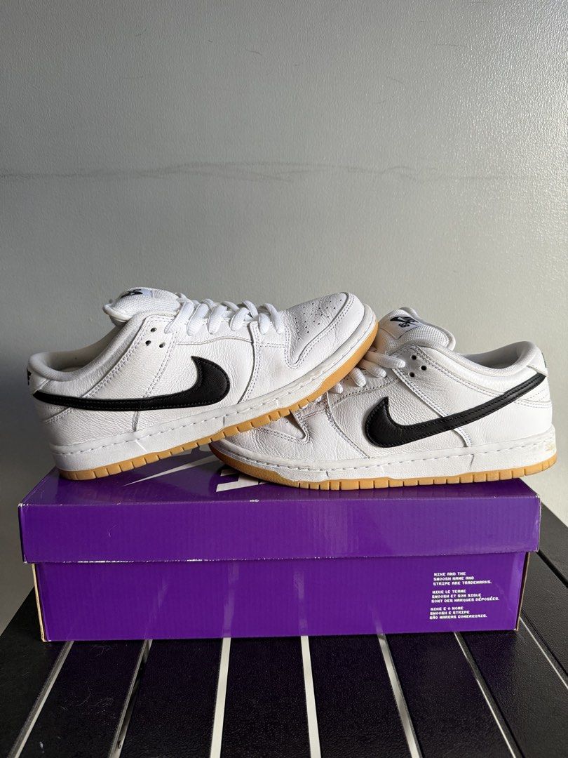 Nike SB Dunk Low Pro White Black Gum (Category: Sneakers) located in Quezon City. Submitted by prince.eros (Listing ID 1467207322, Image 1). Description: - Brand: Nike SB Dunk Low Pro - Colorway: White and Black with classic Gum Soles - Size: Men's US 7.5 / Women's US 9 - Condition: Clean overall with minor toe creasing from normal wear - Inclusions: Original purple SB box included - Shipping: On hand and ready to ship.