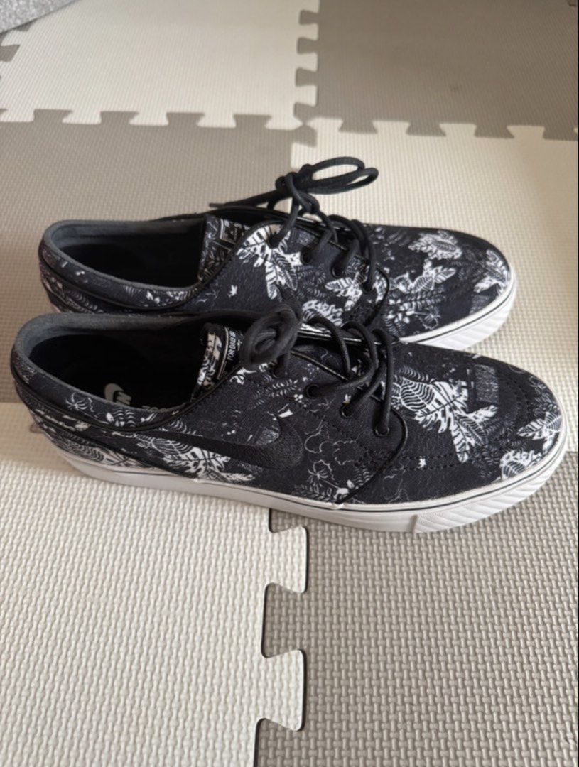 Nike SB Stefan Janoski Black Florals (Category: Sneakers) located in San Juan City. Submitted by flackawacka (Listing ID 1467339513, Image 2). Description: - Brand: Nike SB Stefan Janoski - Design: Black and white floral pattern canvas upper - Comfort: Zoom Air insoles for superior cushioning - Sole: Durable white rubber midsole - Details: Classic low-top silhouette with black laces and signature woven tongue label - Condition: 100% authentic and