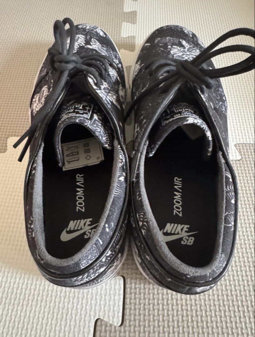 Nike SB Stefan Janoski Black Florals (Category: Sneakers) located in San Juan City. Submitted by flackawacka (Listing ID 1467339513, Image 3). Description: - Brand: Nike SB Stefan Janoski - Design: Black and white floral pattern canvas upper - Comfort: Zoom Air insoles for superior cushioning - Sole: Durable white rubber midsole - Details: Classic low-top silhouette with black laces and signature woven tongue label - Condition: 100% authentic and