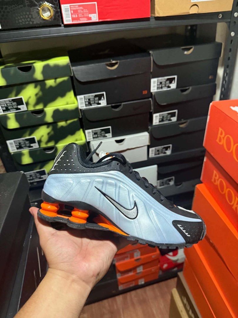 Nike Shox R4 (Category: Sneakers) located in Manila. Submitted by rmolde.0424 (Listing ID 1467262967, Image 1). Description: - Authentic Nike Shox TL sneakers in a striking black, ice blue, and bright orange colorway - Full-length mechanical cushioning columns at the heel for maximum comfort and impact absorption - Breathable mesh upper reinforced with TPU overlays and reflective details for visibility - Textured rubber outsole delivers reliable,