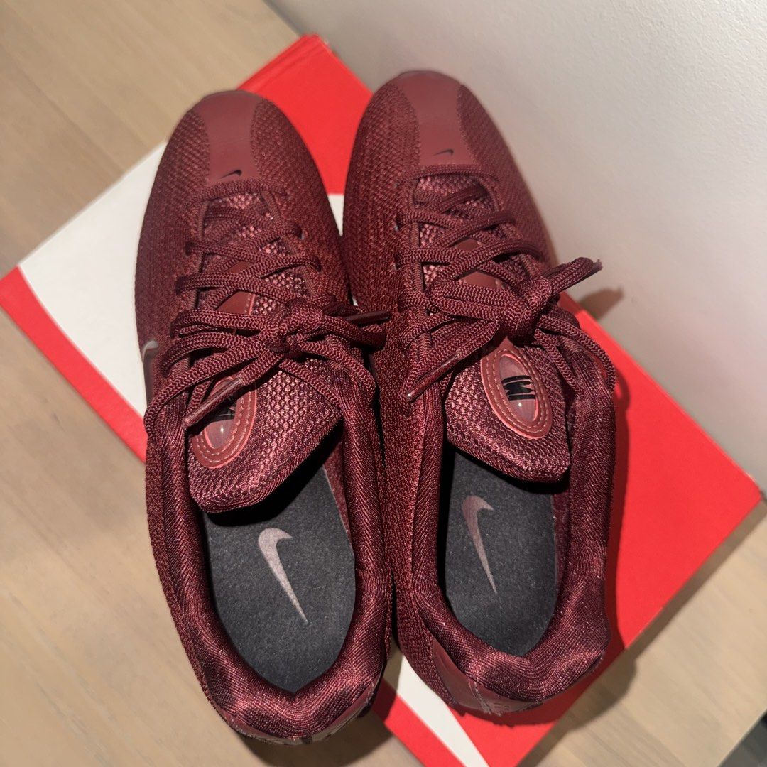 NIKE Shox Z - Maroon (Category: Sneakers) located in Pasig City. Submitted by jd917 (Listing ID 1467315323, Image 3). Description: - Bought this from Nike app! - Size 6 US - Womens - Used 3-5x - Really unique silhouette - love the colorway - A bit creased but overall great condition - comes with the box & paper packaging .