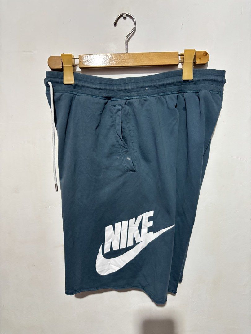 Nike Sweatshorts with White Logo (Category: Shorts) located in Subic. Submitted by thriftpoison (Listing ID 1467274473, Image 3). Description: Nike Allumni - Xlarge - Waist 32-36 Length 20 - Material: Soft and comfortable fleece - Waistband: Elasticated with adjustable white drawstrings - Pockets: Two front hand pockets and one back pocket with Nike tag - Design: Trendy raw cut hem at the bottom - Fit: Relaxed fit, ideal for workouts or everyday 
