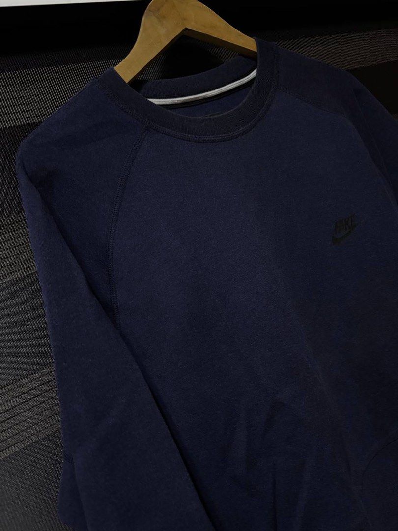 Nike Techfleece Navy Blue Sweatshirt Crewneck (Category: Coats, Jackets and Outerwear) located in Pasig City. Submitted by abogadosupremo (Listing ID 1467352173, Image 3). Description: - Classic navy blue Nike Techfleece sweatshirt - Comfortable raglan sleeves - Convenient front pocket - Simple Nike logo on chest - Ideal for casual wear or layering - Versatile and easy to pair with any outfit - 100% Legit and Authentic - Very Good Condition - Col