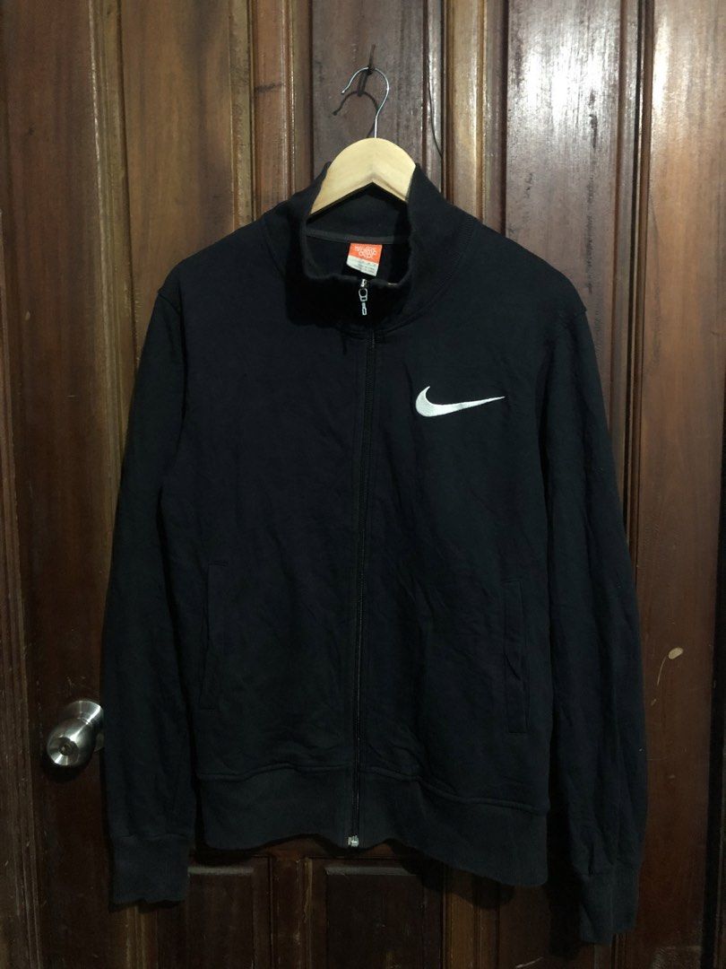 Nike The Athletic Dept Track & Field Zip Jacket (Category: Coats, Jackets and Outerwear) located in Quezon City. Submitted by yeahsource222 (Listing ID 1467241890, Image 1). Description: - Brand: Nike - Type: Full-zip jacket - Color: Black - Size: Medium - Details: Orange Athletic Dept tag, small front swoosh, large back swoosh with 'Track & Field EST. 72' graphic - Material: Comfortable cotton blend - Condition: Good - Best for: Casual wear or t