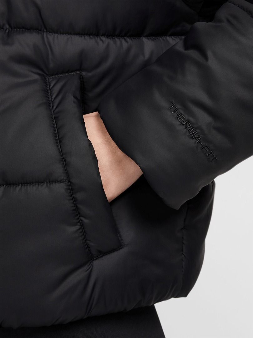 Nike Therma-FIT Black Puffer Jacket (Women's) (Category: Coats, Jackets and Outerwear) located in Pasig City. Submitted by p.re.loved (Listing ID 1467268570, Image 3). Description: - Nike black puffer jacket with Therma-FIT technology - Super warm and cozy, perfect for cold weather and winter - Full zip front with an attached hood - Convenient side pockets for your hands - Clean, versatile design that matches any outfit - Features an embroidered 