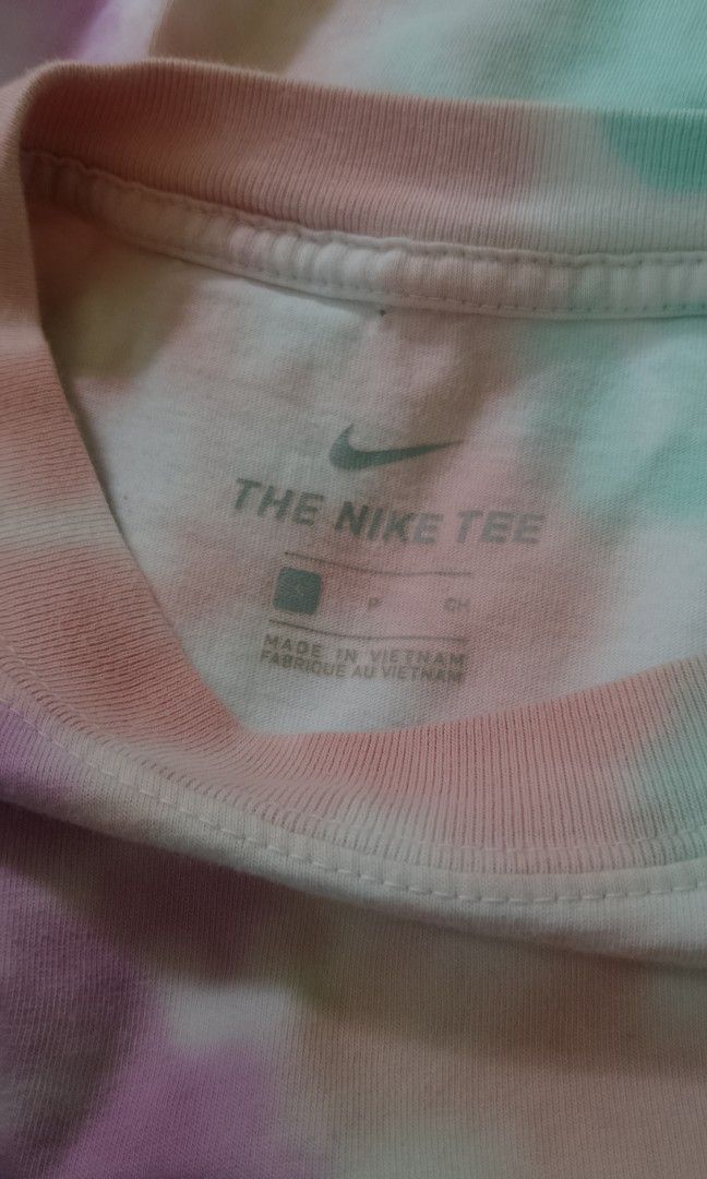 Nike tie dye (Category: Tshirts & Polo Shirts ) located in Oas. Submitted by yortzzz (Listing ID 1467306619, Image 3). Description: This is a Nike Sportswear Max90 Wild Tie-Dye T-shirt featuring a pastel tie-dye pattern and an embroidered white Swoosh logo on the chest.
