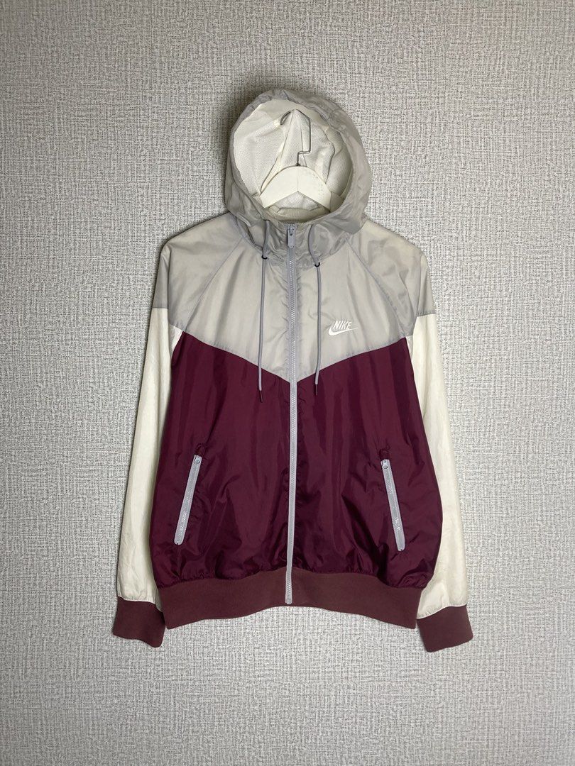 Nike Windrunner Hooded Jacket Burgundy Grey White Size M (Category: Coats, Jackets and Outerwear) located in Baguio. Submitted by drip_n_drop (Listing ID 1467325913, Image 1). Description: - Brand: Nike - Style: Classic Windrunner colorblock (Burgundy/Grey/White) - Size: Medium (Made in Vietnam) - Features: Full zip, drawstring hood, zippered side pockets, breathable mesh lining - Condition: Clean, lightweight everyday outerwear - Trusted Carouse
