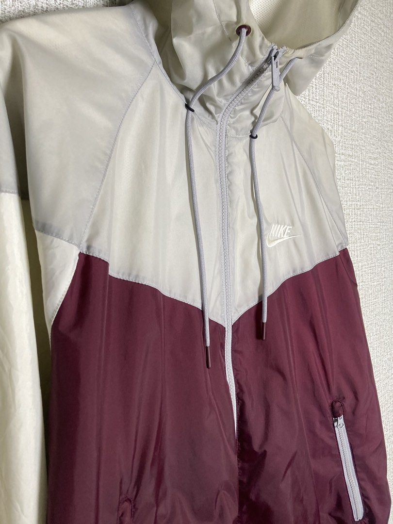 Nike Windrunner Hooded Jacket Burgundy Grey White Size M (Category: Coats, Jackets and Outerwear) located in Baguio. Submitted by drip_n_drop (Listing ID 1467325913, Image 3). Description: - Brand: Nike - Style: Classic Windrunner colorblock (Burgundy/Grey/White) - Size: Medium (Made in Vietnam) - Features: Full zip, drawstring hood, zippered side pockets, breathable mesh lining - Condition: Clean, lightweight everyday outerwear - Trusted Carouse