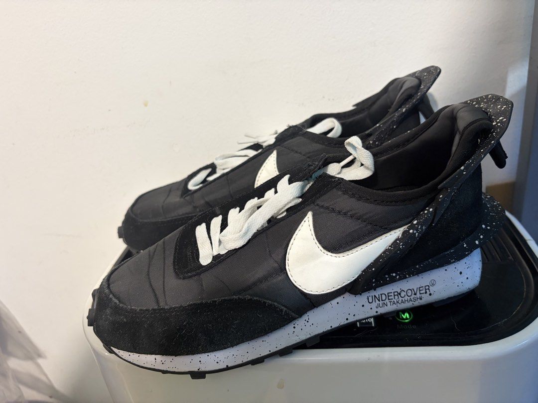 Nike x Undercover Daybreak Black White Size US 7 (Category: Sneakers) located in Quezon City. Submitted by jndr1984 (Listing ID 1467251085, Image 1). Description: - Model: Nike x Undercover Daybreak - Colorway: Black nylon with white leather swoosh, black suede overlays, and speckled midsole - Size: US 7 / EUR 38 / UK 4.5 - Condition: Clean soles with minimal wear (check photos) - Details: Features signature Undercover Jun Takahashi branding and 