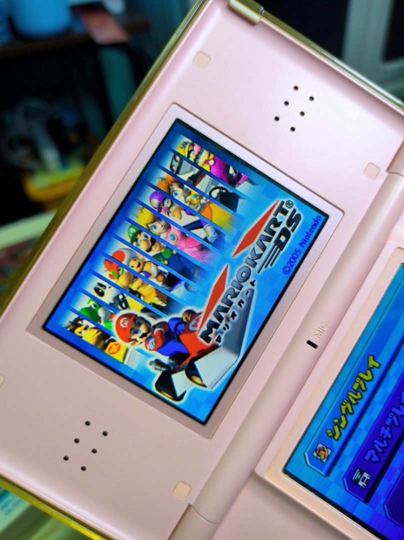 Nintendo DS Lite Pink Bundle with Games and AC Adapter (Category: Nintendo) located in Caloocan City. Submitted by greenearth28555 (Listing ID 1467240810, Image 3). Description: ‼️ PLEASE READ‼️ - Pink Nintendo DS Lite - 100% no issue 👌✨ - Condition: Fully tested, powers on, and screens work normally - with original stylus - Game in Console: Mario Kart DS, Dragon Ball DS, and New Super Mario Bros. - Accessories: Original AC adapter included in b