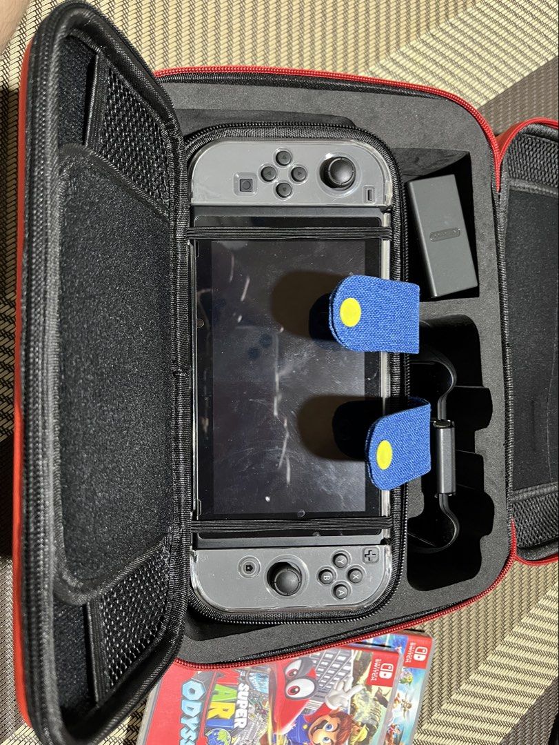 NINTENDO Switch | read description (Category: Nintendo) located in Manila. Submitted by kathryn.frs (Listing ID 1467337456, Image 1). Description: READ FIRST ‼️ open to negotiate - complete inclusion - with casing and themed box - fully working - no cartridges - with HDMI cord for connection - bought directly from toys kingdom w warranty card - bought 2019 - only used twice, kept in the box ever since .
