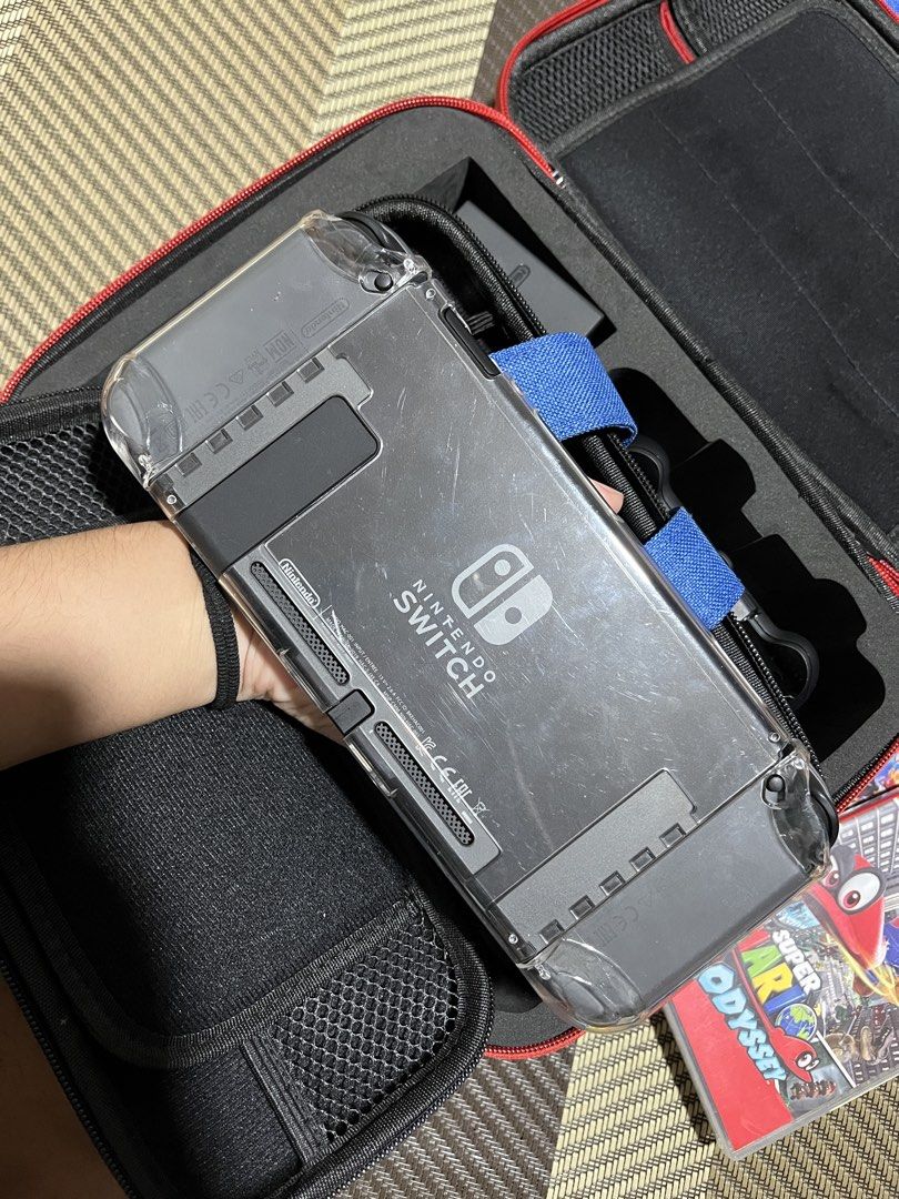 NINTENDO Switch | read description (Category: Nintendo) located in Manila. Submitted by kathryn.frs (Listing ID 1467337456, Image 3). Description: READ FIRST ‼️ open to negotiate - complete inclusion - with casing and themed box - fully working - no cartridges - with HDMI cord for connection - bought directly from toys kingdom w warranty card - bought 2019 - only used twice, kept in the box ever since .