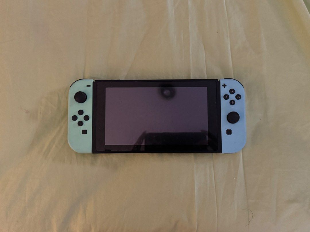 Nintendo Switch console bundle with Mario carrying case and games (Category: Nintendo) located in Manila. Submitted by mavelaa (Listing ID 1467172008, Image 1). Description: Comes with 2 SD cards and 1 online card (from nintendo e-shop) - Animal Crossing -Mario Kart - Tomodachi Life (Nintendo e-shop) Doesn't come with the TV Dock anymore ‼️ Price is still negotiable - STRICTLY payment first.
