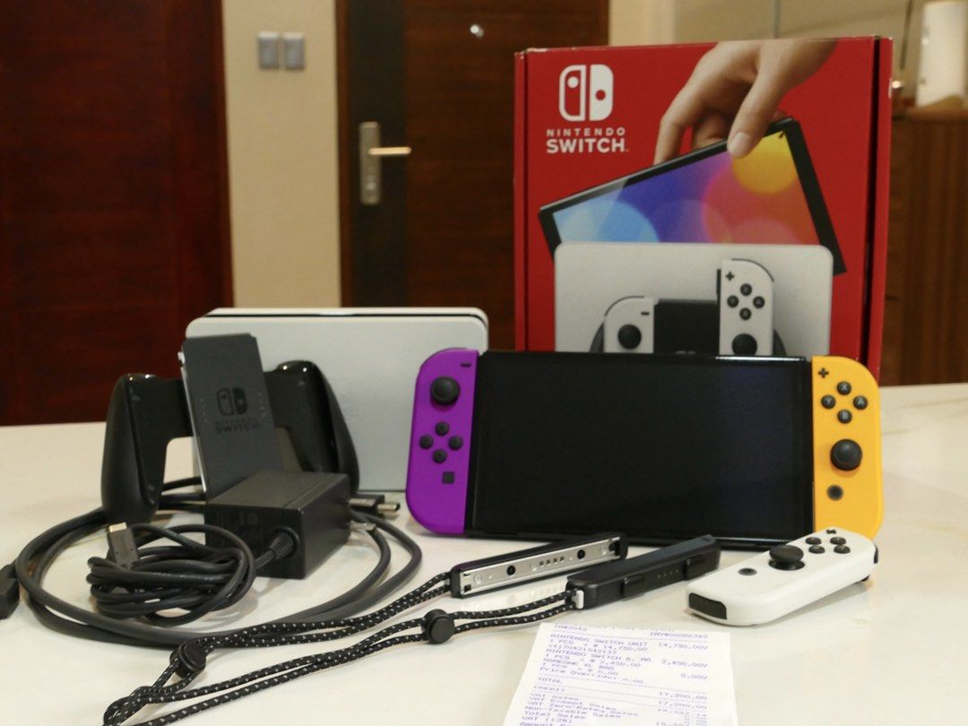 Nintendo Switch OLED (Category: Nintendo) located in Bacoor. Submitted by yztrella (Listing ID 1467268515, Image 2). Description: Complete Inclusions with 1 extra joycon with 2 virtual games: - pokemon cafe remix - it takes two no issues negotiable .