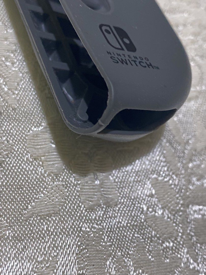 Nintendo Switch V1 Joycon Cover (Category: Cases & Covers) located in Imus. Submitted by thislegitfrfr (Listing ID 1467276169, Image 3). Description: Issue: has a small tear in the bottom (can be seen in the last pic).