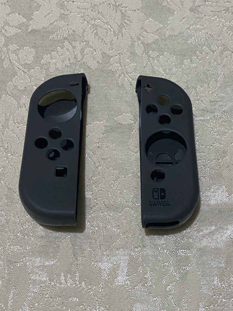 Nintendo Switch V1 Joycon Cover (Category: Cases & Covers) located in Imus. Submitted by thislegitfrfr (Listing ID 1467276169, Image 1). Description: Issue: has a small tear in the bottom (can be seen in the last pic).