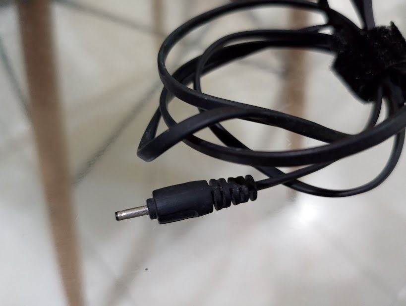 Nokia AC Wall Charger Power Adapter (Category: Chargers) located in Quezon City. Submitted by susmaryosep1 (Listing ID 1467269197, Image 1). Description: - Authentic original Nokia wall charger - Features a thin barrel connector pin and standard US two-prong plug - Comes with an attached black cable, neatly coiled - Includes a reusable velcro strap for easy storage and portability - Ideal backup or replacement power adapter for compatible older N