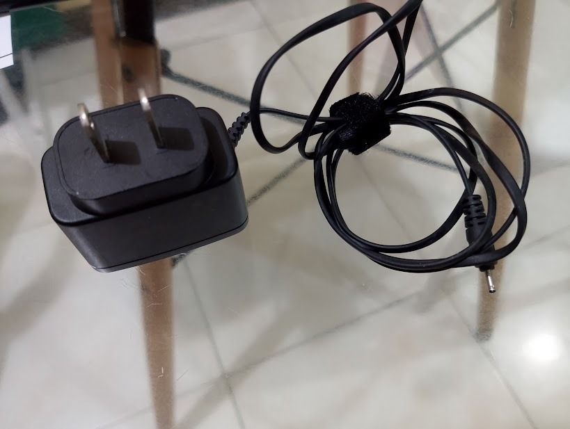 Nokia AC Wall Charger Power Adapter (Category: Chargers) located in Quezon City. Submitted by susmaryosep1 (Listing ID 1467269197, Image 2). Description: - Authentic original Nokia wall charger - Features a thin barrel connector pin and standard US two-prong plug - Comes with an attached black cable, neatly coiled - Includes a reusable velcro strap for easy storage and portability - Ideal backup or replacement power adapter for compatible older N