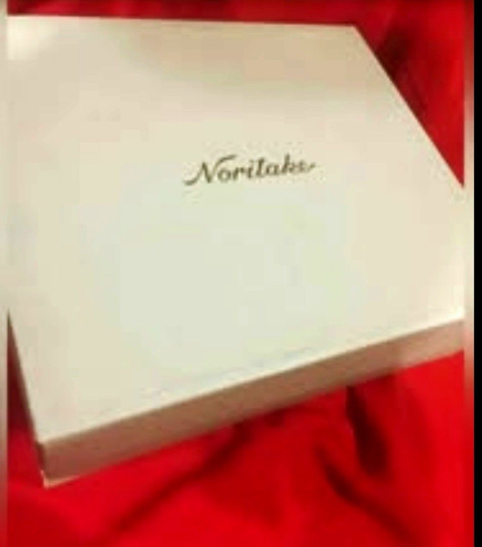 Noritake White Ceramic Cup and Saucer Set in Box (Category: Coffee & Tea Tableware) located in Cainta. Submitted by veronica2277 (Listing ID 1467266449, Image 1). Description: - Brand: Noritake - Item: White ceramic cup and saucer set - Design: Subtle textured exterior with a glossy finish and gold-toned handles - Condition: Brand new, never used - Packaging: Complete set in original branded presentation box with protective paper Note: saucers ha