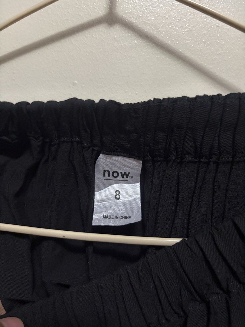 Now Off-Shoulder Black Blouse Size 8 (Category: Blouses) located in Quezon City. Submitted by j.steffy (Listing ID 1467327219, Image 2). Description: - Brand: Now - Color: Black - Style: Off-shoulder basic top with attached long sleeves - Fit: Comfortable elastic neckline - Size: Tagged Size 8 - Condition/Origin: Made in China, great for casual wear.