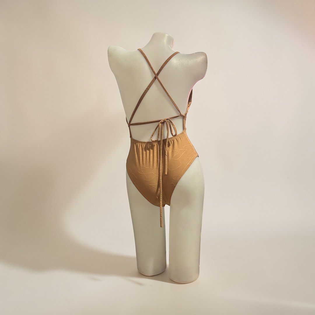 Nude One-Piece Swimsuit Deep V-Neck Cross Back (Category: Bikinis & Swimsuits) located in Santa Cruz. Submitted by homedecluttersale (Listing ID 1467248529, Image 2). Description: •Bought in Japan🇯🇵 • Used / Excellent condition • Fits Small to medium • Photos taken using mannequin only 🚚 Shipping via J&T only 📦 Shipping fee to be shouldered by buyer 💳 Mode of payment: GCash 📍 Santa Cruz, Laguna.