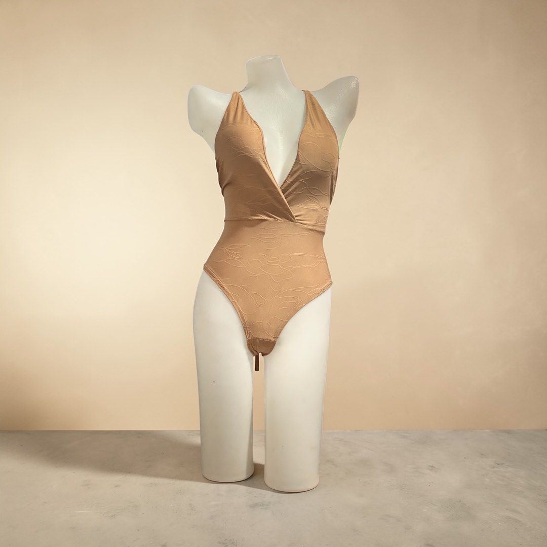 Nude One-Piece Swimsuit Deep V-Neck Cross Back (Category: Bikinis & Swimsuits) located in Santa Cruz. Submitted by homedecluttersale (Listing ID 1467248529, Image 1). Description: •Bought in Japan🇯🇵 • Used / Excellent condition • Fits Small to medium • Photos taken using mannequin only 🚚 Shipping via J&T only 📦 Shipping fee to be shouldered by buyer 💳 Mode of payment: GCash 📍 Santa Cruz, Laguna.