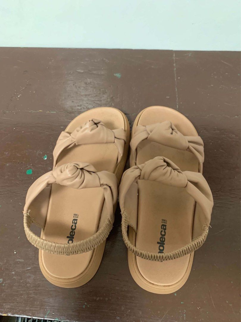 Nude platform sandals size 10 wide (Category: Flats & Sandals) located in Borongan. Submitted by kabes_jane (Listing ID 1467188300, Image 2). Description: - Color: Versatile nude shade - Design: Double straps with knotted details and thick sole - Fit: Elastic back strap for easy slip-on wear and secure fit - Perfect for everyday casual outfits - Size 10 wide.