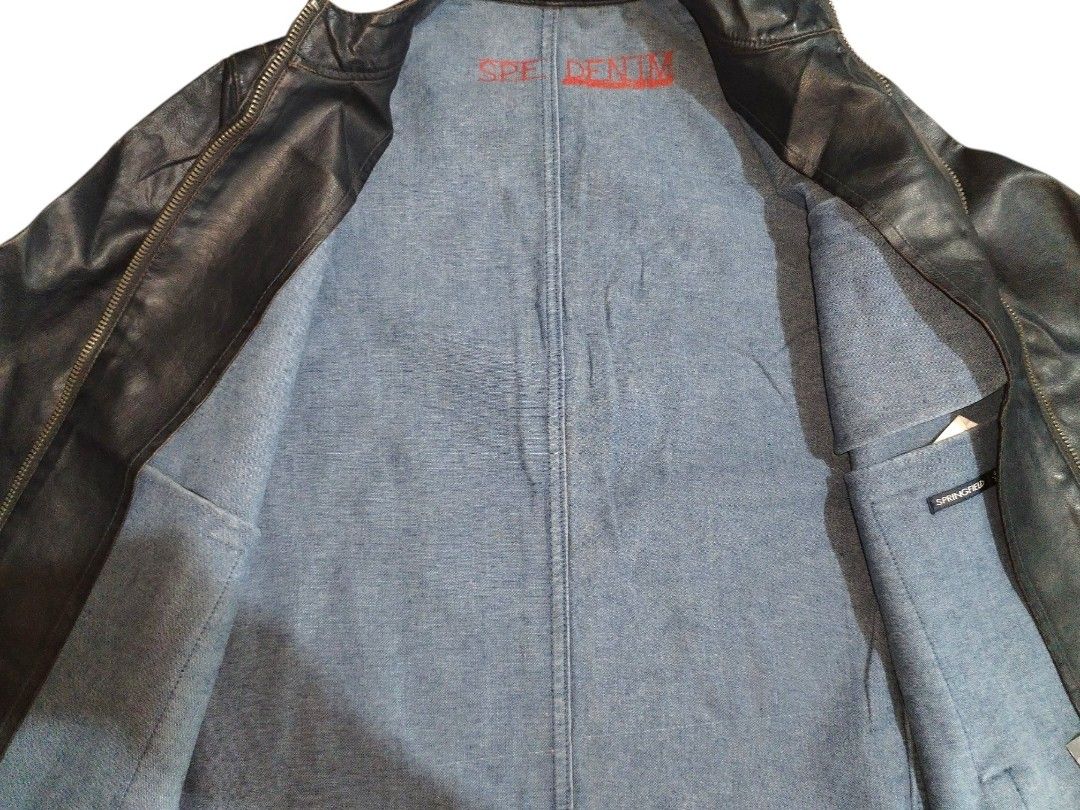 NWT Springfield Moto Jacket (Category: Coats, Jackets and Outerwear) located in Baguio. Submitted by luxeloomarchive (Listing ID 1467205616, Image 3). Description: NWT Springfield Moto Jacket — Made in Spain Up for grabs is a like new condition Springfield cafe racer jacket in dark blue with contrast cream racing stripes down the sleeves. Designed by Eurofiel Confección in Madrid, Spain, it features a sharp Mandarin collar, quilted shoulder detai