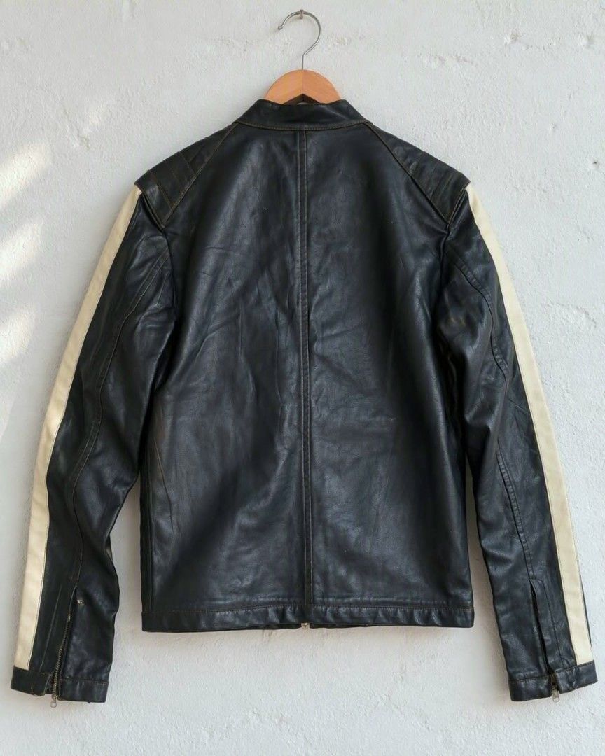 NWT Springfield Moto Jacket (Category: Coats, Jackets and Outerwear) located in Baguio. Submitted by luxeloomarchive (Listing ID 1467205616, Image 2). Description: NWT Springfield Moto Jacket — Made in Spain Up for grabs is a like new condition Springfield cafe racer jacket in dark blue with contrast cream racing stripes down the sleeves. Designed by Eurofiel Confección in Madrid, Spain, it features a sharp Mandarin collar, quilted shoulder detai